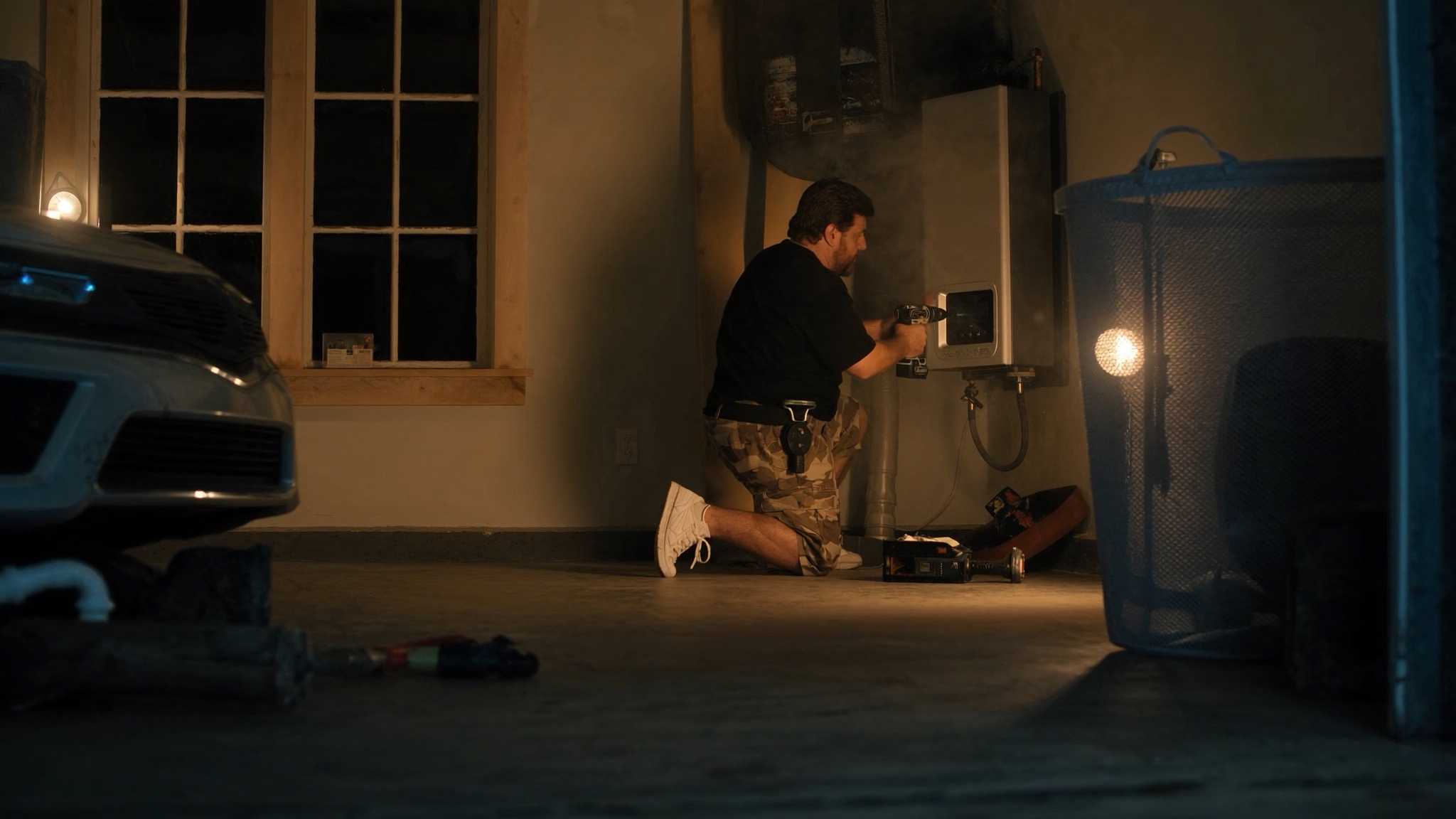 Technician installing a tankless water heater