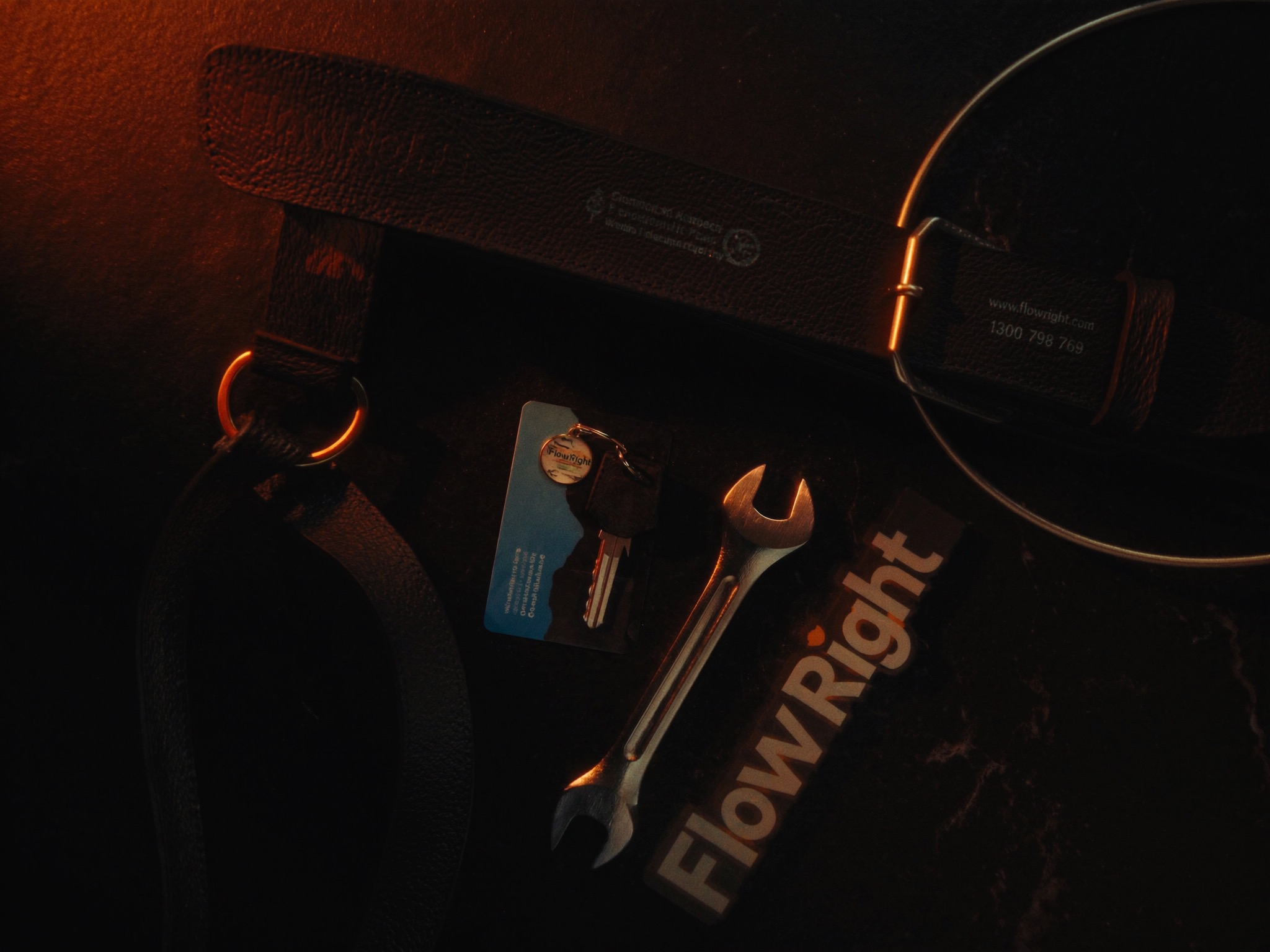 FlowRight Priority Membership branded toolbelt and keys